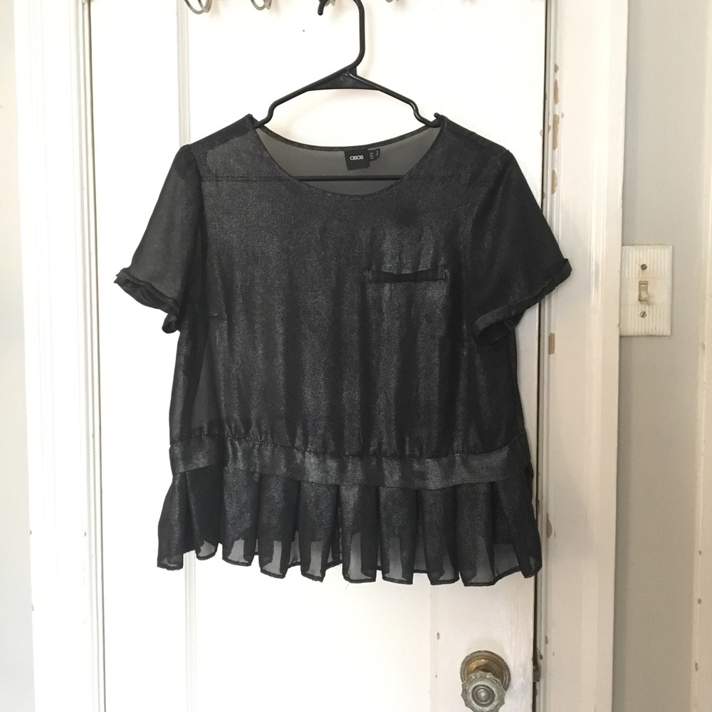 Shimmery sheer black peplum party top